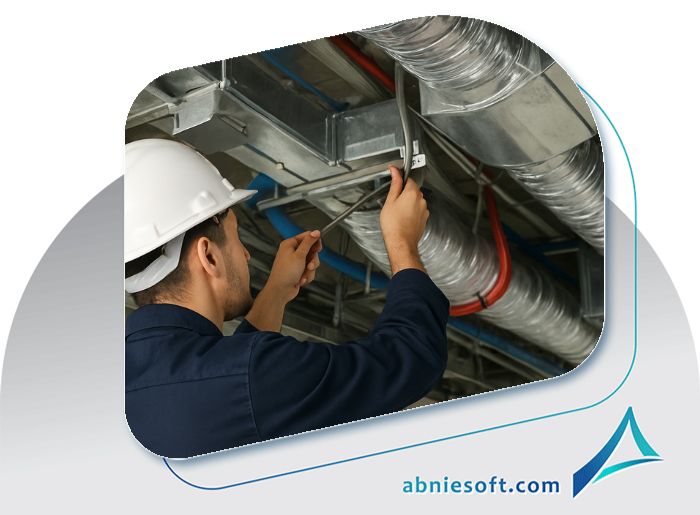 تصویر فرد فنیکاری که درحال استفاده از پیچگوشتی و پیمانکاری تأسیسات ساختمان است.